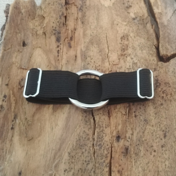 Black harness bracelet with a silver hoop